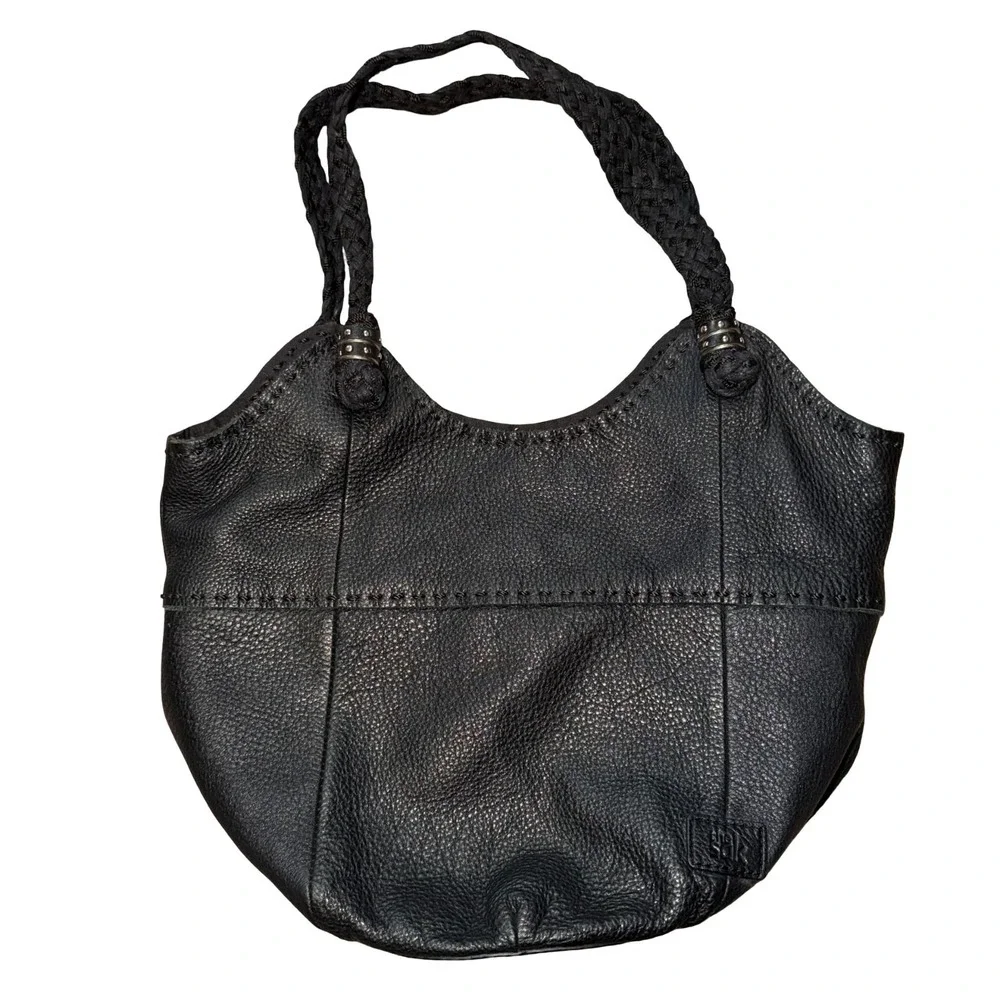 The Sak Indio black leather hobo bag, braided shoulder straps
